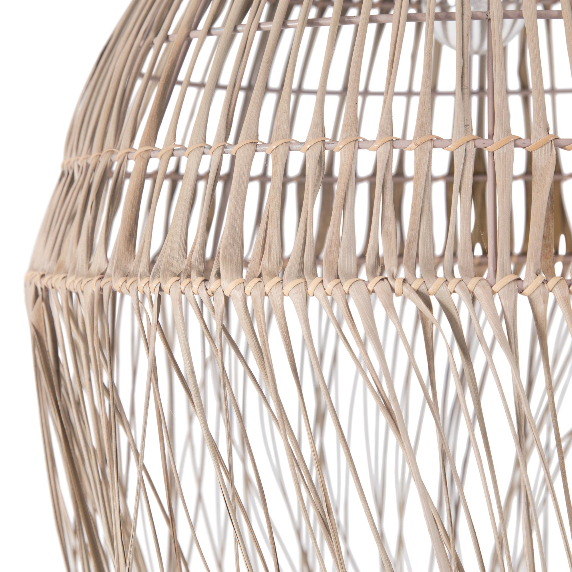 Handwoven rattan pendant light featuring an intricate open-weave dome design with natural fringe detailing. This organic lighting piece adds texture and warmth to any space, perfect for coastal and bohemian interiors