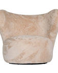 Luxurious beige teddy swivel armchair featuring a sculptural curved back and plush upholstery. A cosy and stylish accent chair designed for comfort and modern interiors