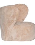 Luxurious beige teddy swivel armchair featuring a sculptural curved back and plush upholstery. A cosy and stylish accent chair designed for comfort and modern interiors