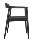 Elegant black dining chair with a woven seat and a sleek timber frame. A refined and modern seating option for contemporary interiors