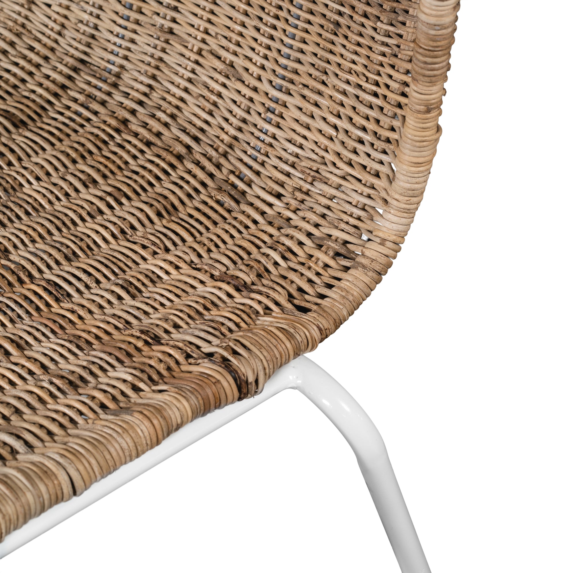 Contemporary dining chair with a sleek white metal frame and a handwoven natural rattan seat and backrest, offering a stylish and comfortable alfresco seating option