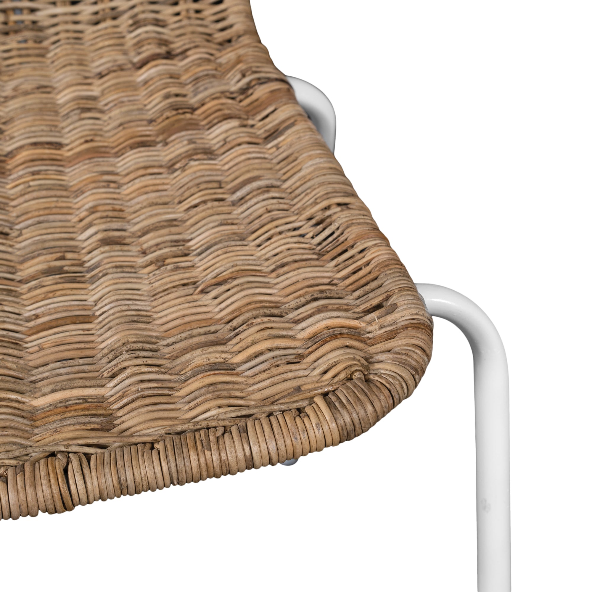 Contemporary dining chair with a sleek white metal frame and a handwoven natural rattan seat and backrest, offering a stylish and comfortable alfresco seating option