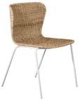 Contemporary dining chair with a sleek white metal frame and a handwoven natural rattan seat and backrest, offering a stylish and comfortable alfresco seating option