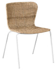 Contemporary dining chair with a sleek white metal frame and a handwoven natural rattan seat and backrest, offering a stylish and comfortable alfresco seating option