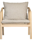 Minimalist ash armchair with natural linen cushions, featuring a sleek Scandinavian-inspired frame