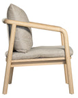 Minimalist ash armchair with natural linen cushions, featuring a sleek Scandinavian-inspired frame