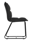 Black cushioned dining chair with a plush padded seat and high backrest, supported by a sleek black metal frame for a contemporary and comfortable seating option