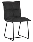 Black cushioned dining chair with a plush padded seat and high backrest, supported by a sleek black metal frame for a contemporary and comfortable seating option