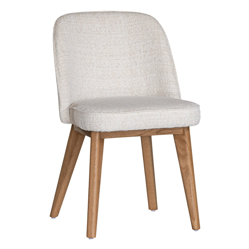 Elegant boucle dining chair with a curved upholstered backrest and plush cushioned seat, supported by tapered lightwood legs. A refined and comfortable seating option for modern dining spaces