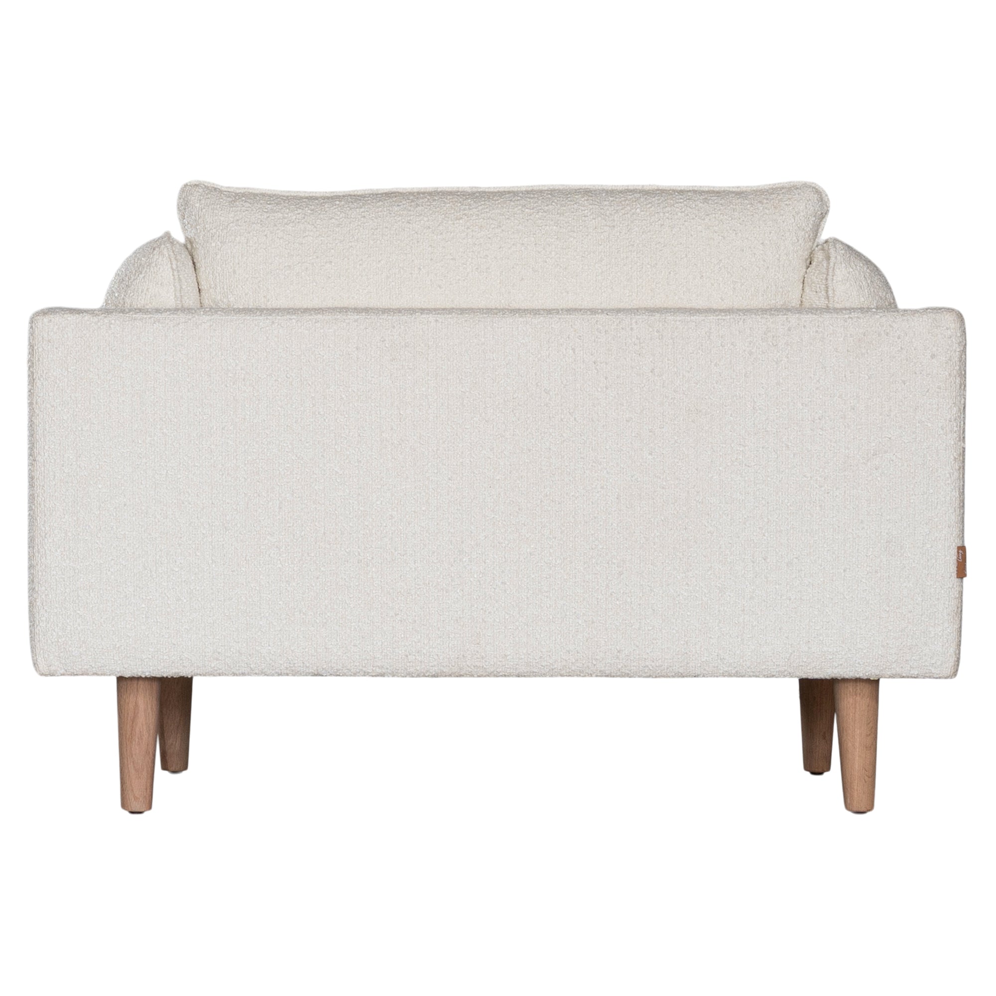 A luxurious white boucle armchair from KULALA Living, featuring plush cushioning and natural timber legs. A contemporary and stylish seating option designed for comfort and modern interiors