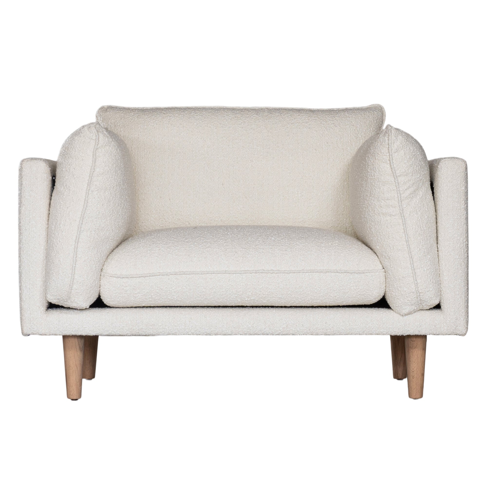 A luxurious white boucle armchair from KULALA Living, featuring plush cushioning and natural timber legs. A contemporary and stylish seating option designed for comfort and modern interiors