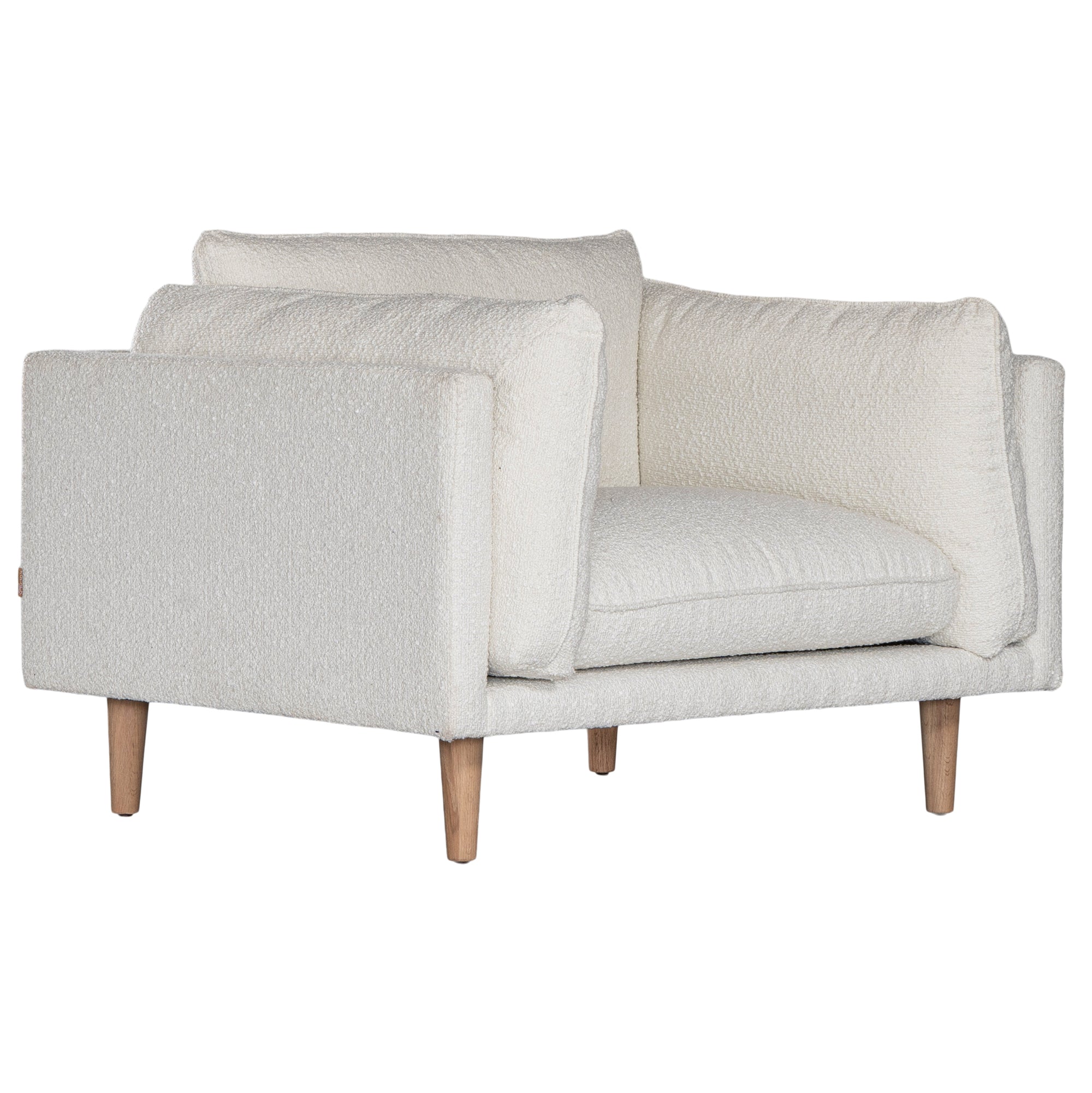 A luxurious white boucle armchair from KULALA Living, featuring plush cushioning and natural timber legs. A contemporary and stylish seating option designed for comfort and modern interiors