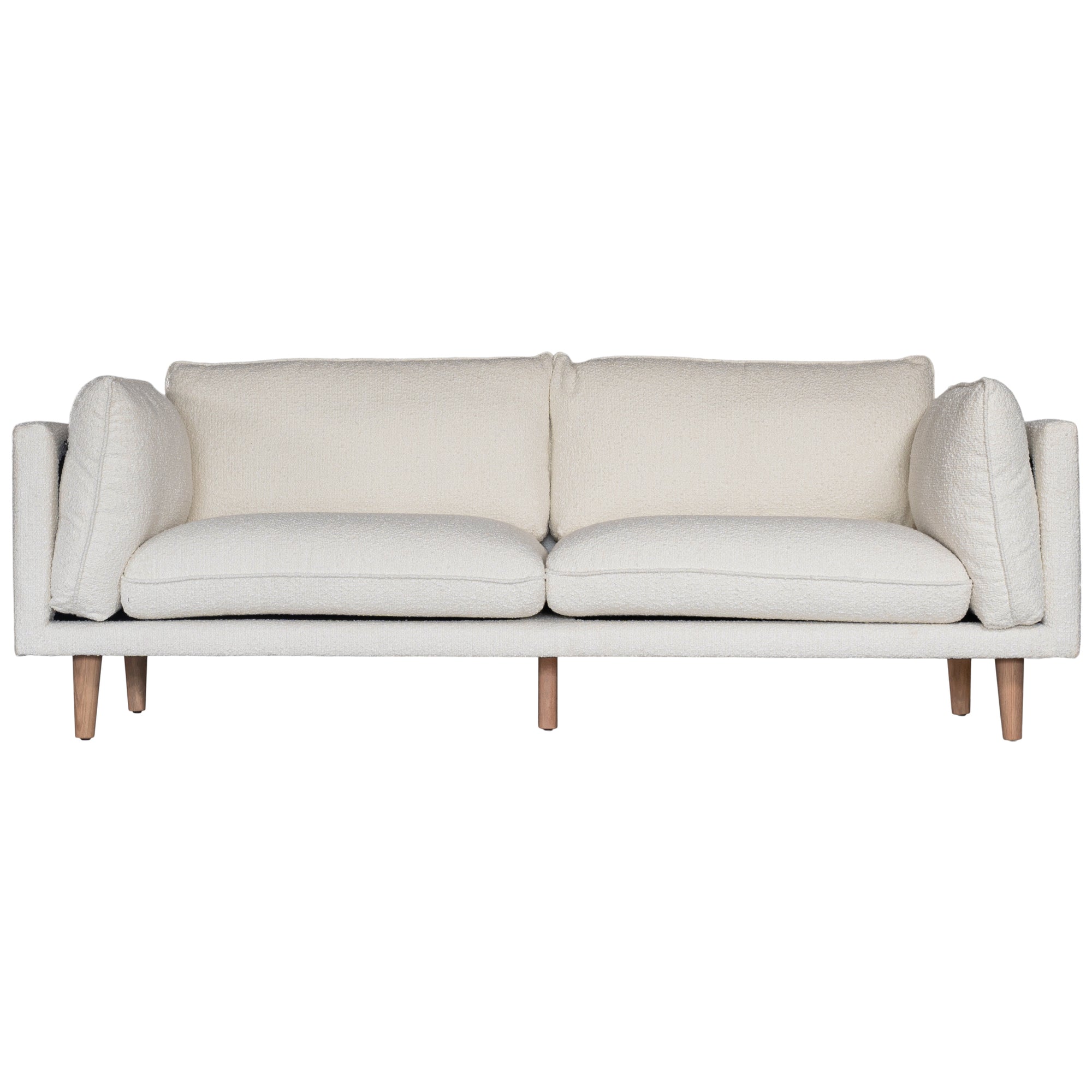 A modern white boucle sofa from KULALA Living, designed with plush cushioning and natural timber legs. A statement piece for contemporary interiors, offering both style and comfort