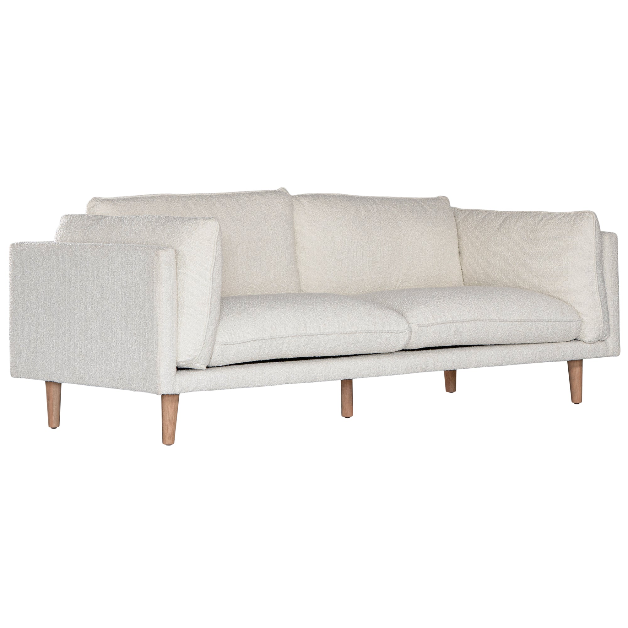 A modern white boucle sofa from KULALA Living, designed with plush cushioning and natural timber legs. A statement piece for contemporary interiors, offering both style and comfort