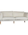 A modern white boucle sofa from KULALA Living, designed with plush cushioning and natural timber legs. A statement piece for contemporary interiors, offering both style and comfort