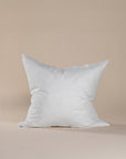 60cm x 60cm plush cushion insert in crisp white, designed for luxurious comfort and optimal shape retention in cushion covers