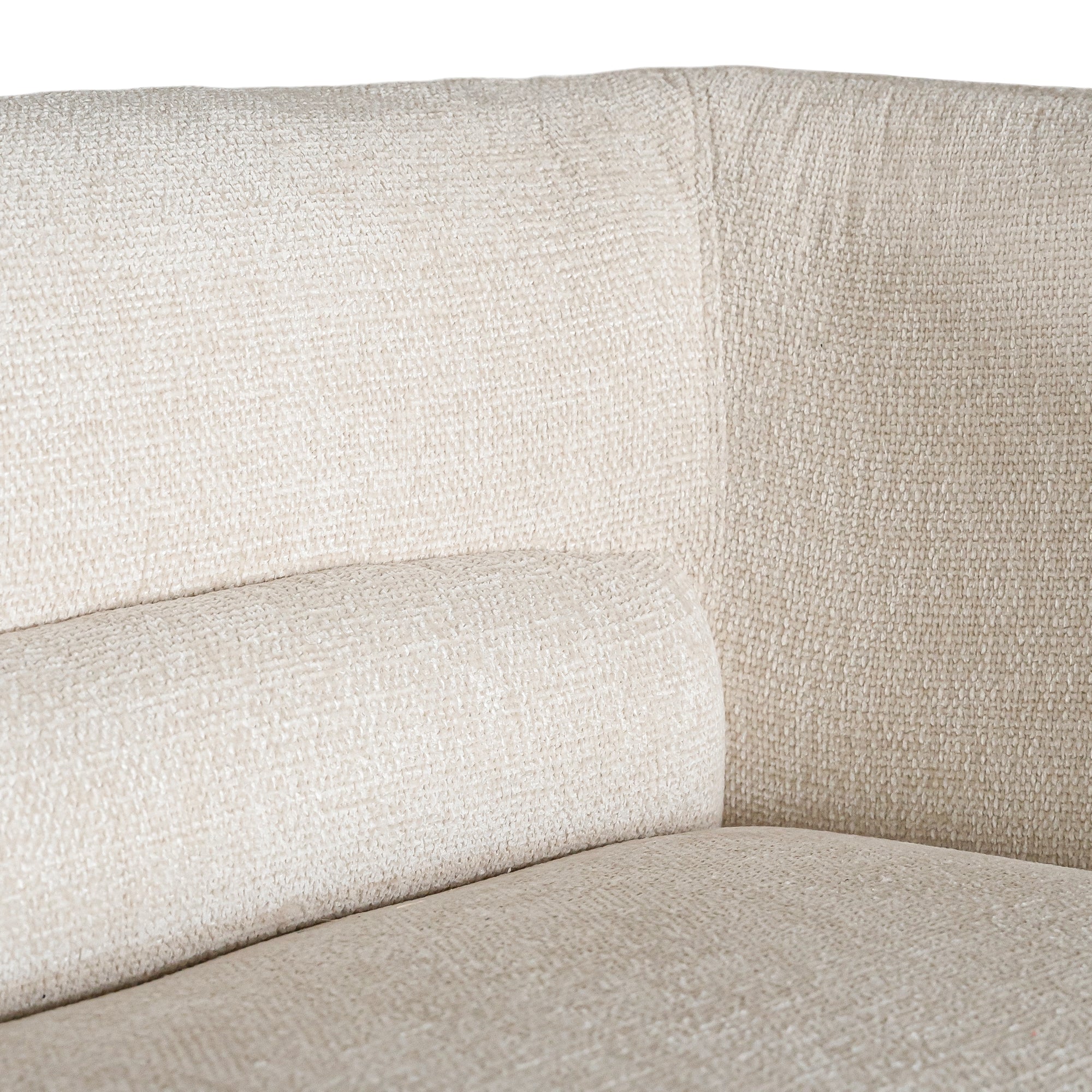 A modern curved sofa upholstered in soft ivory bouclé fabric from KULALA Living. Designed for comfort and style, this contemporary accent chair adds elegance to any living space