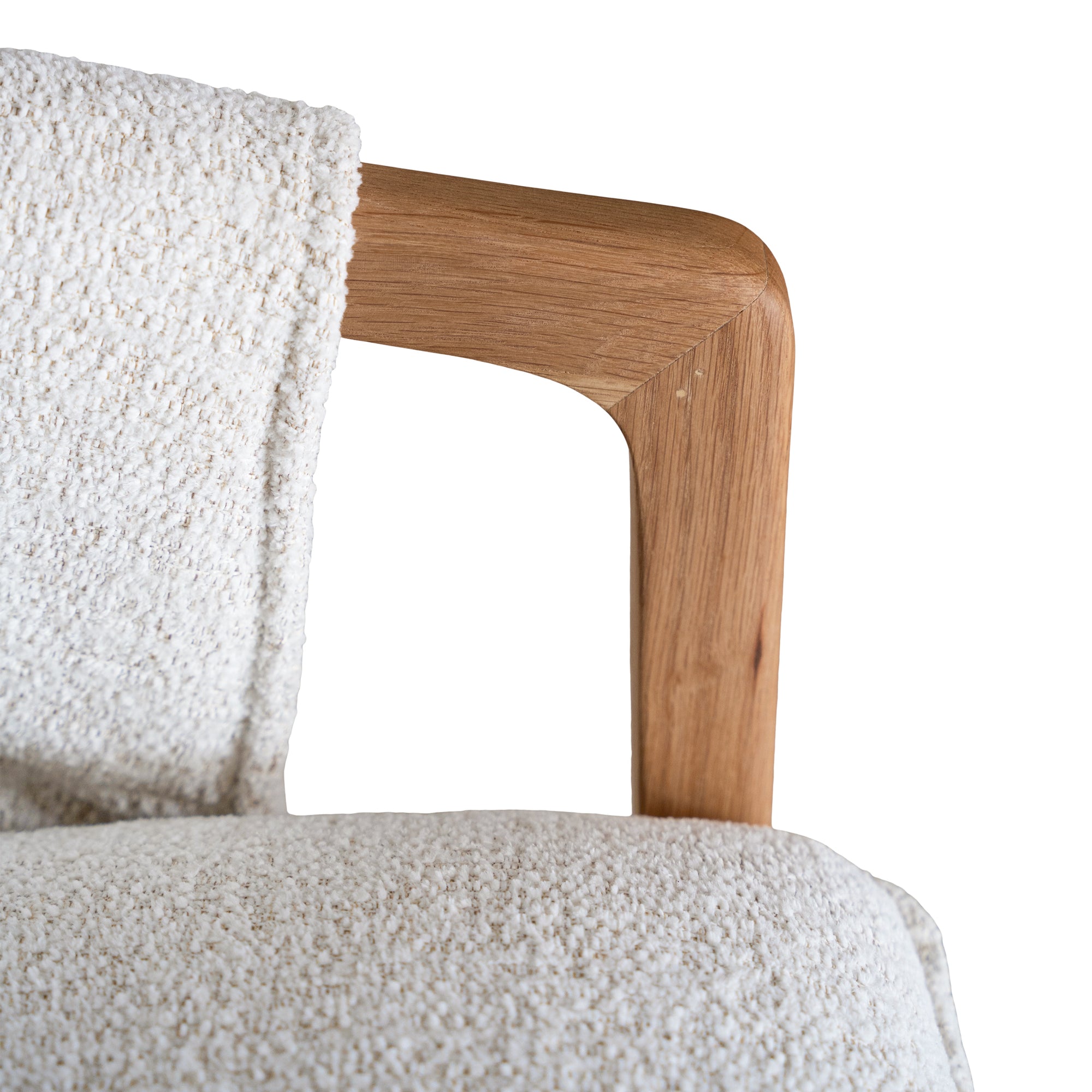 A sophisticated Hamptons-style armchair from KULALA Living, featuring a natural oak frame and soft linen upholstery in a neutral hue. Designed for both comfort and elegance, perfect for contemporary and coastal interiors