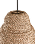 A natural handwoven jute pendant light with a conical silhouette and fringed base, suspended from a black cord. The organic texture and earthy tones create a relaxed, coastal-inspired aesthetic, perfect for enhancing bohemian, rustic, or modern interiors