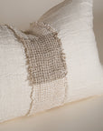 Handcrafted linen cushion in a soft cream hue, featuring a textured woven centre panel for a rustic yet refined aesthetic