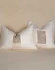 Handcrafted linen cushion in a soft cream hue, featuring a textured woven centre panel for a rustic yet refined aesthetic