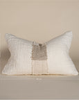 Handcrafted linen cushion in a soft cream hue, featuring a textured woven centre panel for a rustic yet refined aesthetic