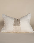 Handcrafted linen cushion in a soft cream hue, featuring a textured woven centre panel for a rustic yet refined aesthetic