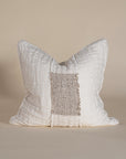 Handcrafted linen cushion in a soft cream hue, featuring a textured woven centre panel for a rustic yet refined aesthetic