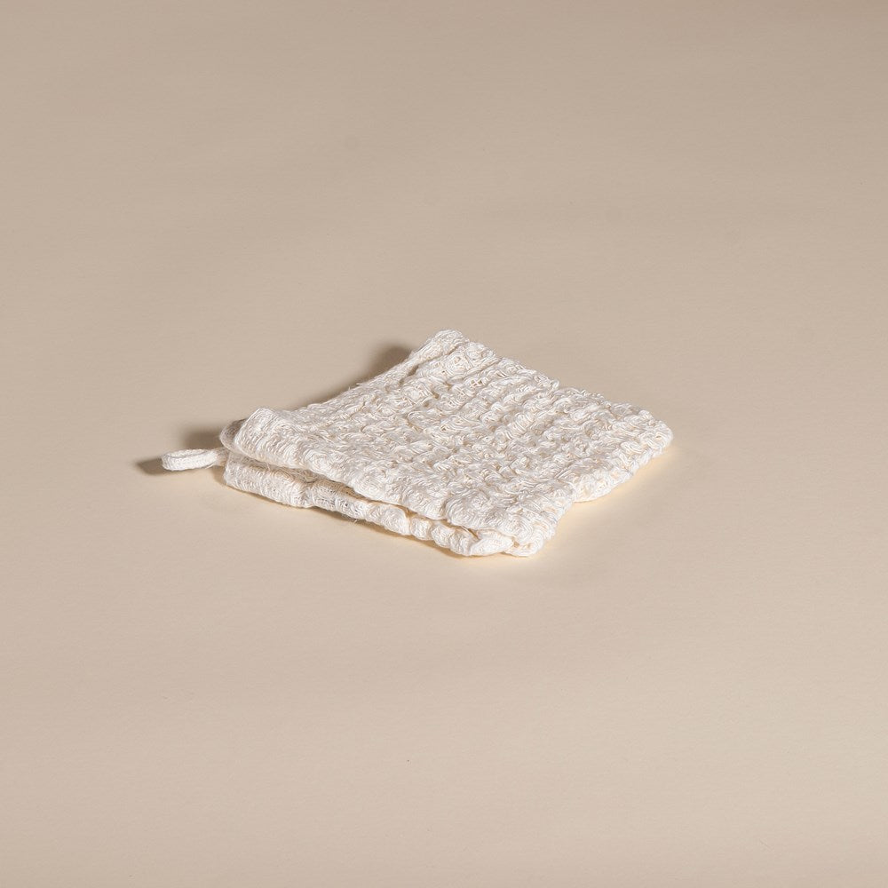 A beautifully handwoven linen face washer from KULALA Living, featuring a soft texture and elegant edges. Perfect for layering and style in any space