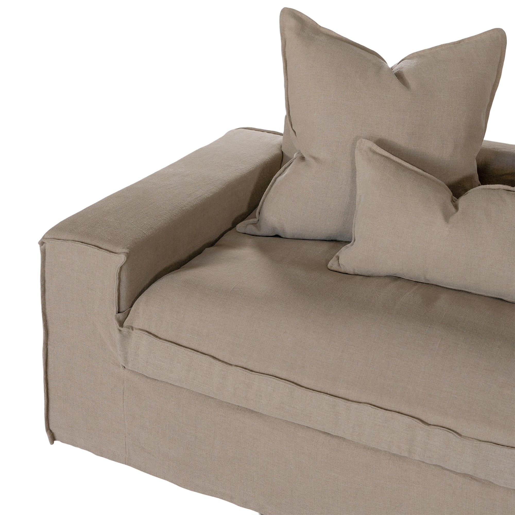 Linen slipcover sectional sofa, designed for effortless comfort and relaxed elegance. Features a modular design with plush cushions and a timeless neutral hue