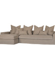 Linen slipcover sectional sofa, designed for effortless comfort and relaxed elegance. Features a modular design with plush cushions and a timeless neutral hue