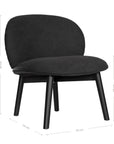 Contemporary black lounge chair with a curved backrest and plush cushioning, supported by sleek black timber legs.