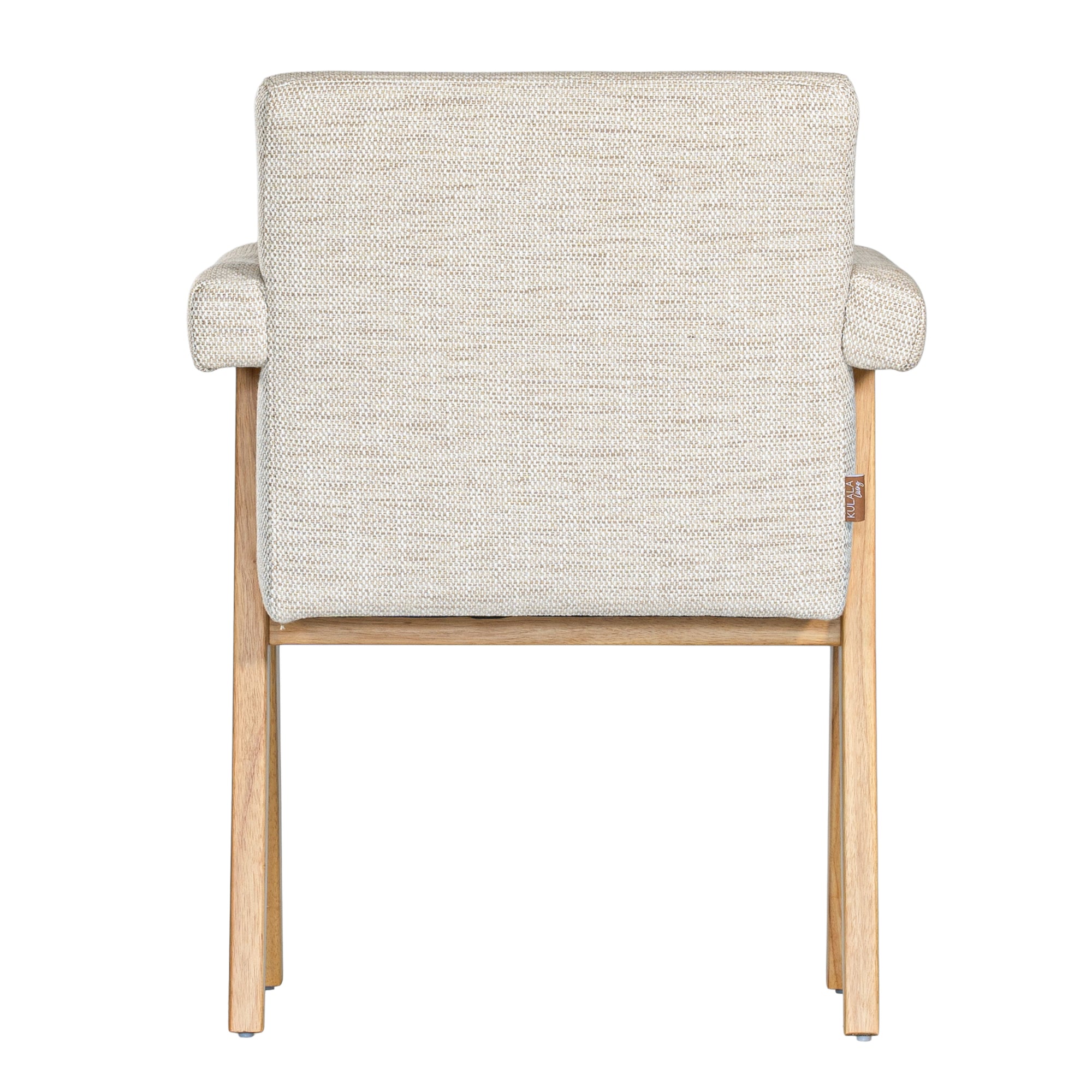 Modern oak dining chair with upholstered seat and backrest in a soft neutral fabric, featuring angled legs and cushioned armrests for comfort