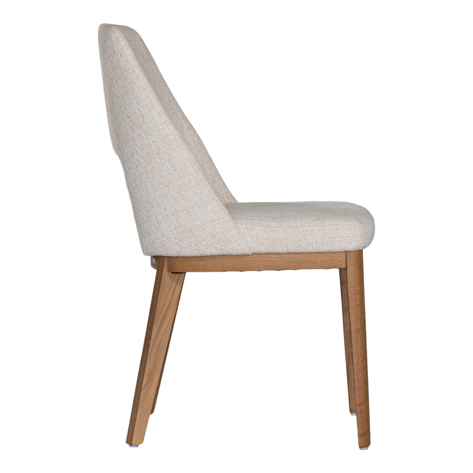 A contemporary dining chair from KULALA Living, featuring soft boucle upholstery and sturdy natural timber legs. Designed for comfort and style, perfect for modern dining spaces