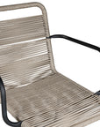 Natural and black outdoor dining chair featuring a sleek powder-coated metal frame and handwoven rope design, perfect for contemporary alfresco spaces