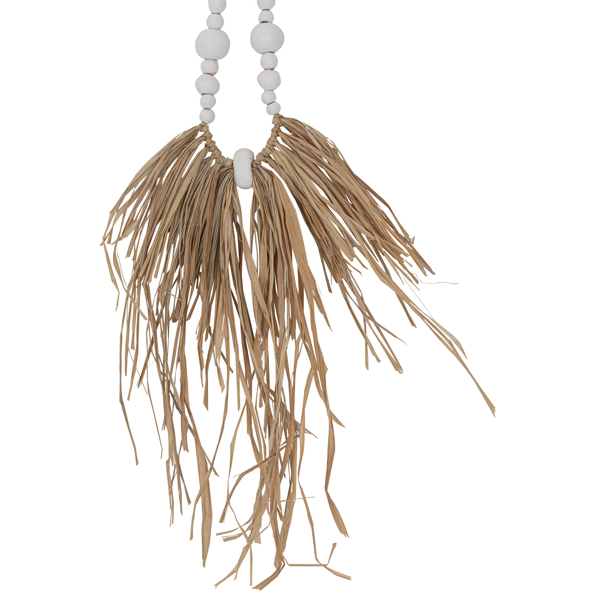 Decorative raffia and shell necklace on a black stand, featuring white wooden beads and natural raffia fringe, ideal for coastal and bohemian interiors