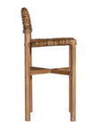 Handwoven rattan bar stool with a sturdy teak frame and curved backrest, showcasing organic texture and artisanal craftsmanship