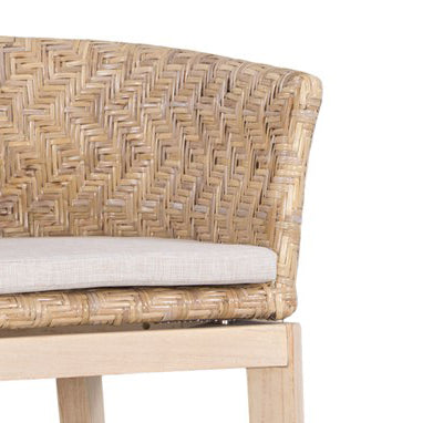 Natural rattan bar stool with a woven backrest, light wood frame, and a cushioned seat, offering a stylish and comfortable seating option for kitchen counters or bars