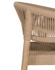 Natural rope dining chair with a teak frame, featuring an elegant curved back and woven seat, perfect for indoor and outdoor settings