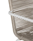 Natural and white outdoor dining chair featuring a sleek powder-coated metal frame and handwoven rope design, perfect for contemporary alfresco spaces