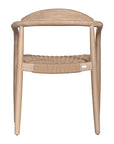 Dining chair featuring a natural wood frame with a curved backrest and a handwoven rope seat, offering a blend of comfort and organic elegance