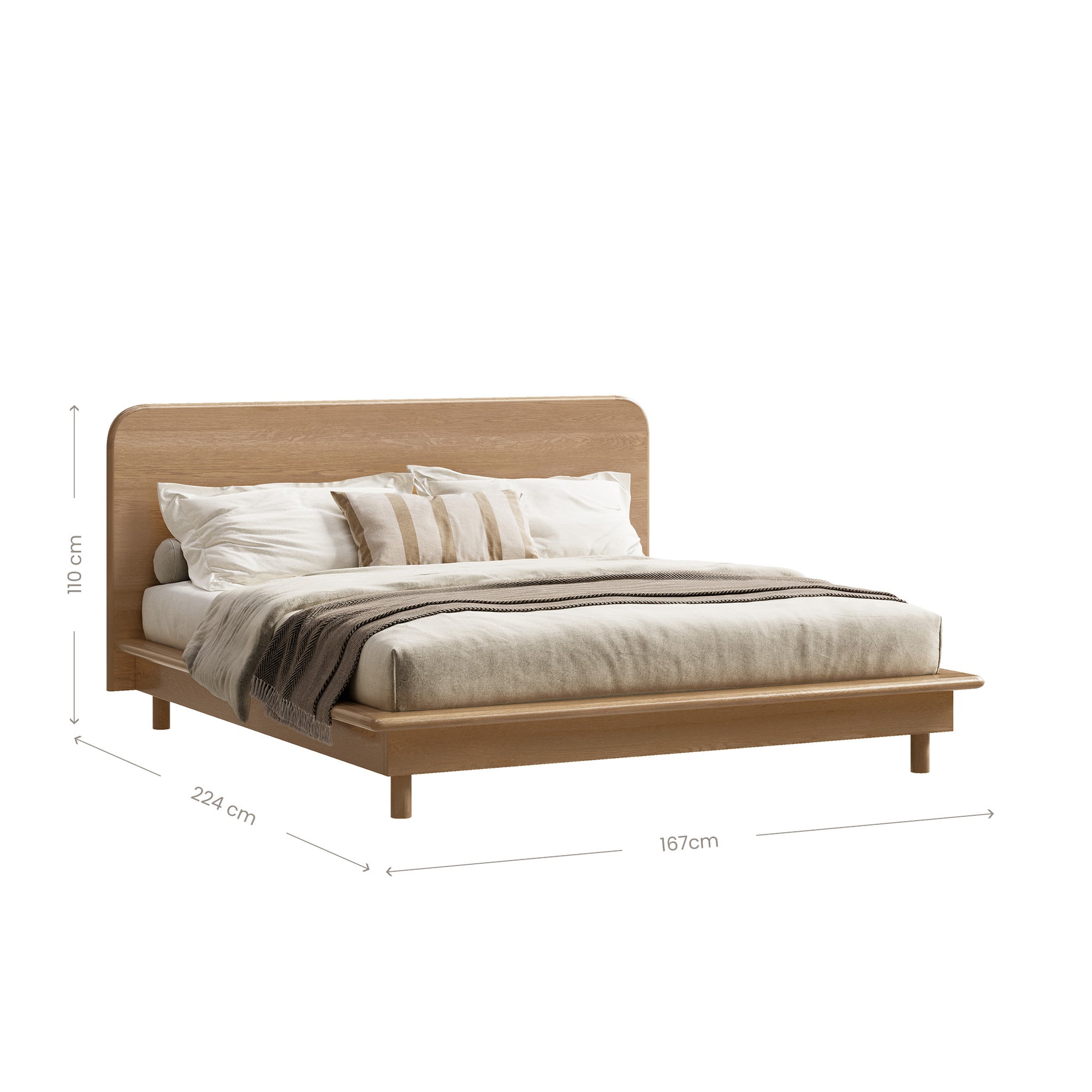 A beautifully crafted oak timber platform bed frame from KULALA Living, featuring a minimalist modern design with a gently curved headboard. Styled with neutral bedding for a serene and inviting bedroom aesthetic