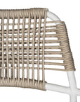 Contemporary outdoor dining chair featuring a sturdy white metal frame with a handwoven rope seat and backrest in a natural tone