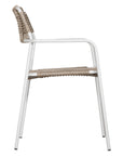 Contemporary outdoor dining chair featuring a sturdy white metal frame with a handwoven rope seat and backrest in a natural tone