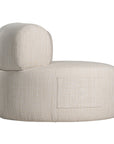 A contemporary pebble upholstered lounge chair with a low-profile design and curved backrest. This modern, armless seating piece features a smooth, rounded silhouette, making it a stylish and comfortable addition to any living space