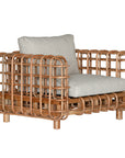 Handcrafted rattan one seater sofa featuring an intricate open-weave frame with plush natural cushions, combining natural texture with contemporary comfort for indoor or covered outdoor spaces