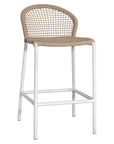 KULALA Living rope-woven bar stool with a curved backrest and a sleek white metal frame, designed for stylish and comfortable seating