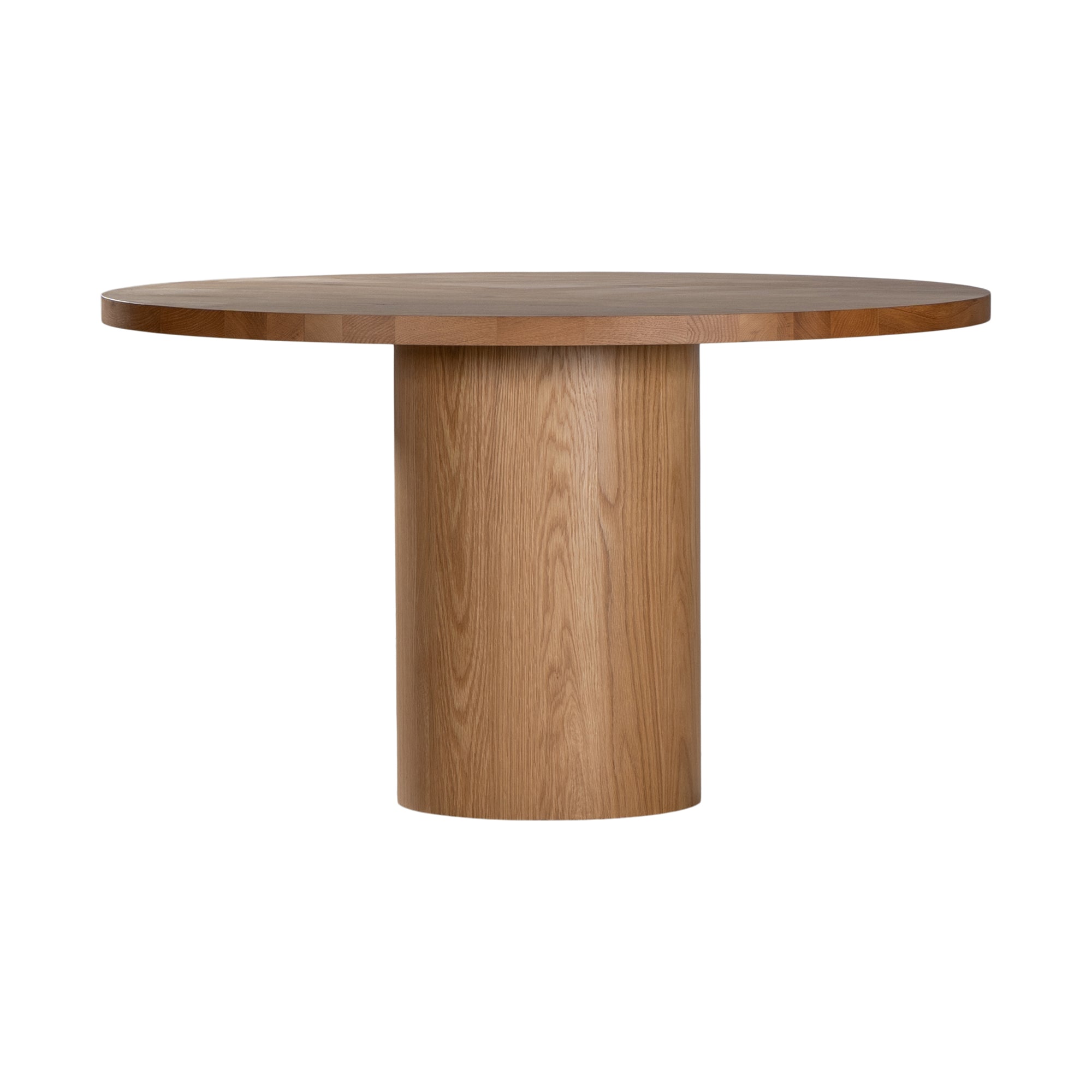 Contemporary round oak pedestal dining table featuring a sleek, minimalist design with a solid cylindrical base and smooth tabletop