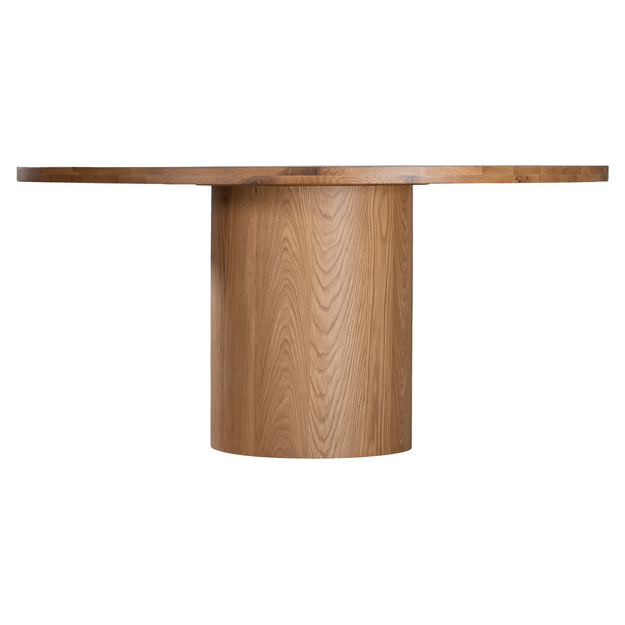 Contemporary round oak pedestal dining table featuring a sleek, minimalist design with a solid cylindrical base and smooth tabletop