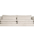 Modern double cloud cushioned sofa in neutral beige with plush pillows and solid wood legs, perfect for contemporary living spaces